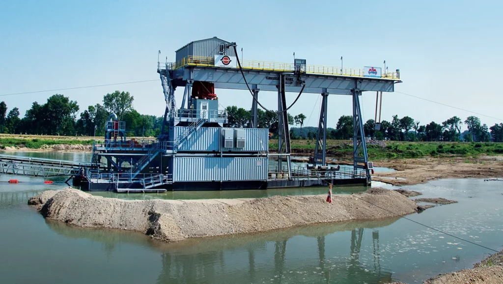 Floating clamshell dredges can remove bottom sediments mechanically. (Photo: P&Q Staff)