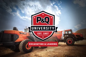 Photo of a wheel loader transferring material into a haul truck