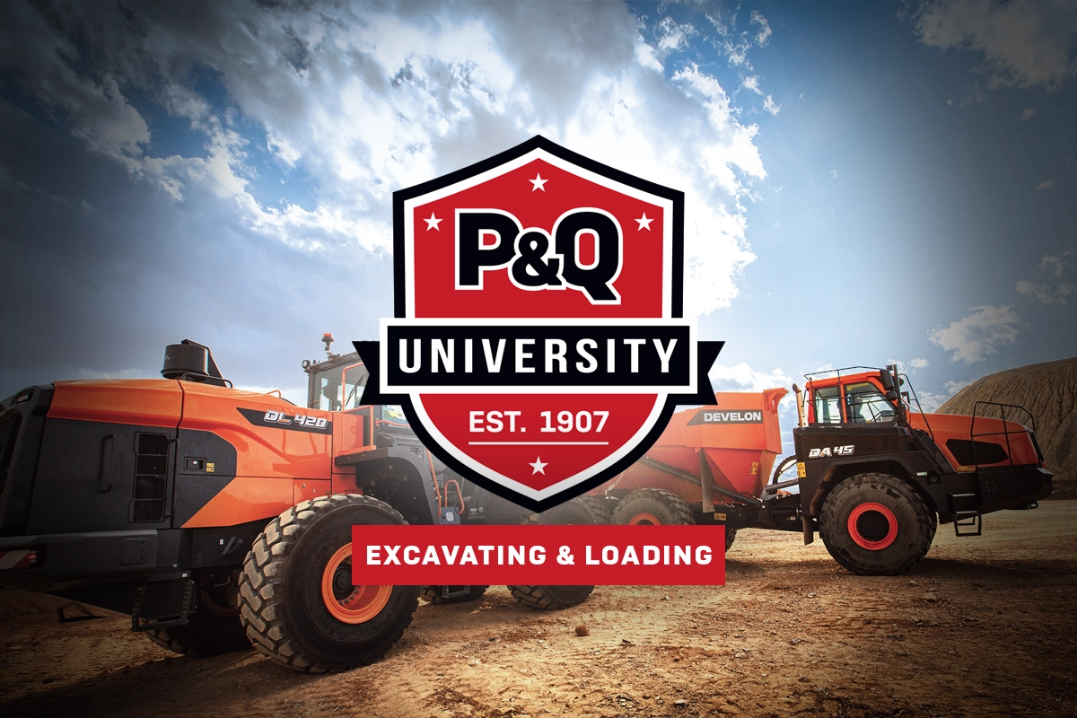 Photo of a wheel loader transferring material into a haul truck