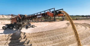 A variable drop height on stacking conveyors helps reduce dust by keeping the fall zone tight. (Photo: Superior)