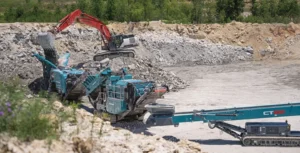 A Premiertrak 450 jaw crusher (left) and an 1150 Maxtrak cone crusher are among the Powerscreen plants in Canfield Materials’ processing fleet. (Photo: Molson Group)