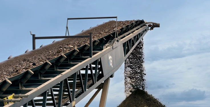 Zac Barbato utilizes an MGL 842T conveyor to stockpile material after it’s been crushed. (Photo: P&Q Staff)