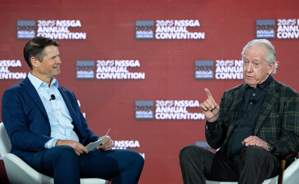 Seen here at the 2025 NSSGA Annual Convention with former New Orleans Saints quarterback Archie Manning (right), Zach Green serves Colas USA as executive vice president and Reeves Construction Co. and Delta Companies as president. (Photo: NSSGA)