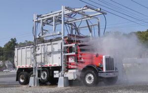 The VTW 360 truck wash from Shumaker Industries includes a pull-through frame and driver-over capability. (Photo: Shumaker Industries)