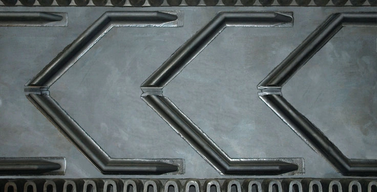 A belt’s material and construction quality is an essential consideration for long-term durability and performance. The heavyweight belting with cleats and corrugated sidewalls shown here was carefully fabricated for a specific aggregate application, as well as to withstand the site’s harsh environment. (Photo: Motion)