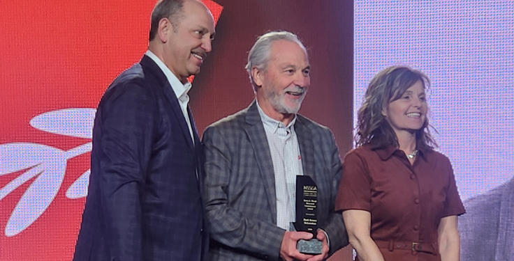 McLanahan Corp.'s Mark Krause (center) is the 2026 recipient of the Barry K. Wendt Memorial Commitment Award. (Photo: P&Q Staff)