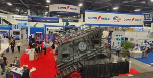 The view from above the Conn-Weld Industries booth in Central Hall as ConExpo-Con/Agg got underway Tuesday morning. (Photo: P&Q Staff)