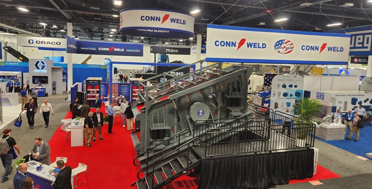 The view from above the Conn-Weld Industries booth in Central Hall as ConExpo-Con/Agg got underway Tuesday morning. (Photo: P&Q Staff)