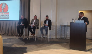 Three producers provided insights during a panel discussion titled "Beyond the Machine: AI, Automation and the Future of Operations." The panelists were (from left) Bryan Scepaniak of WD Scepaniak, Tim Theobald of Kraemer Mining & Materials and Thomas Haun of Turner Staffing Group. Jack Kopanski of Pit & Quarry served as moderator. (Photo: P&Q Staff)