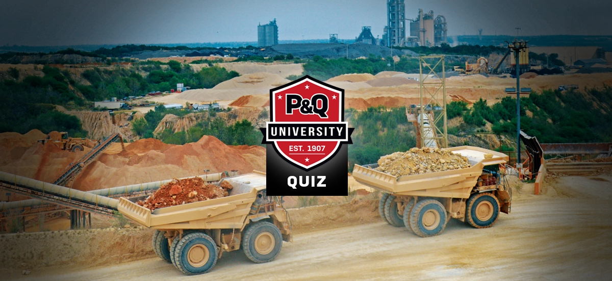 Intro photo for P&Q University Quiz 1 showing two trucks at a quarry