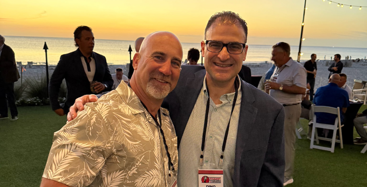 Jeremy Mantz of Loadrite (left) and Pit & Quarry's Dino Vitanza share a moment during the welcome reception. (Photo: P&Q Staff)