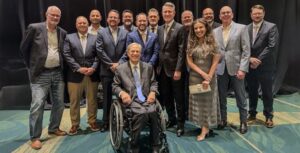 Texas Gov. Greg Abbott (front row, center), visited with TACA president Andrew Pinkerton (second row, fifth from left) and other TACA members during the Texas State University Concrete Industry Management program. (Photo: TACA)